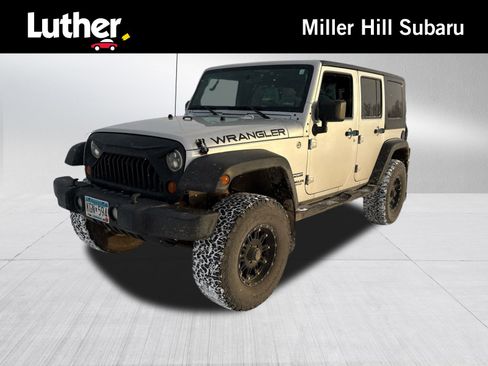 Used 2010 Jeep Wrangler Unlimited Sport image 1