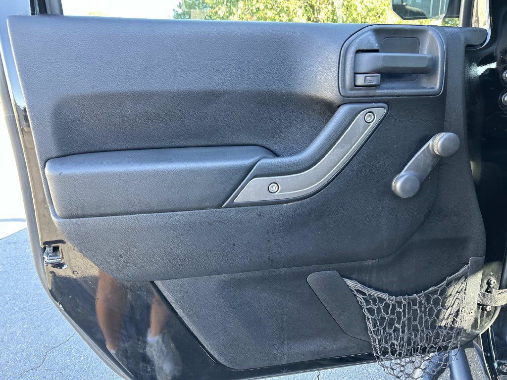 Used 2011 Jeep Wrangler Unlimited Sport w/ Trailer Tow Group AWD/4WD image 19