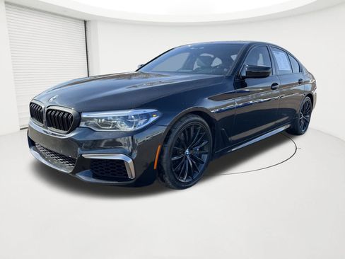Used 2020 BMW M550i xDrive w/ Premium Package image 1