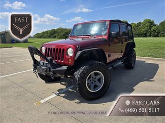 Used 2012 Jeep Wrangler Unlimited Sport image 1
