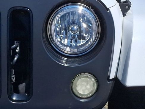 Used 2014 Jeep Wrangler Unlimited Sahara AWD/4WD image 9