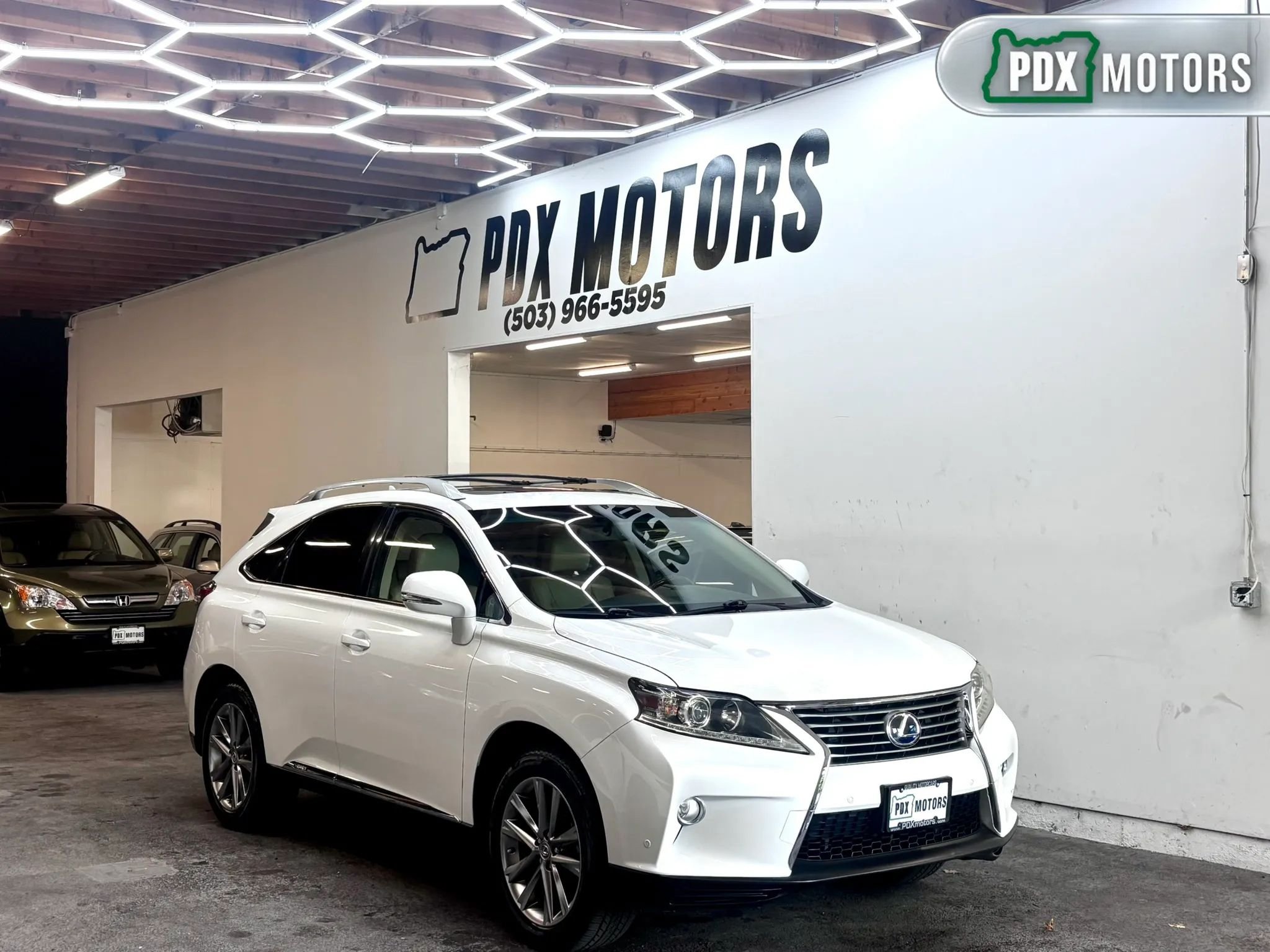 Used 2013 Lexus RX 450h AWD w/ Navigation Pkg image 1