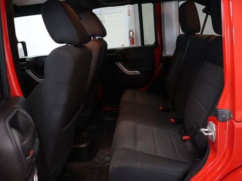 Used 2012 Jeep Wrangler Unlimited Sahara w/ Dual Top Group AWD/4WD image 11