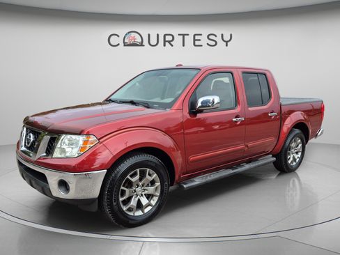 Used 2014 Nissan Frontier SL RWD image 1