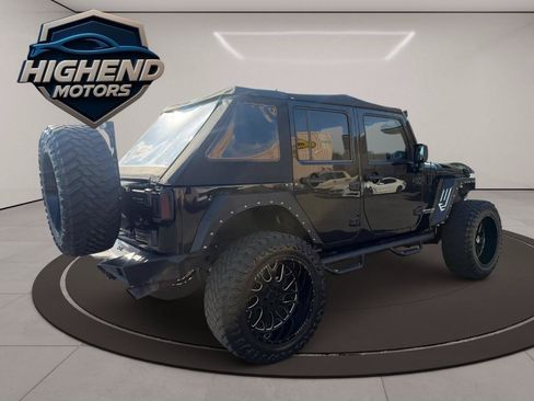 Used 2014 Jeep Wrangler Unlimited Rubicon w/ Dual Top Group AWD/4WD image 6