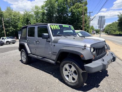 Used 2013 Jeep Wrangler Unlimited Sport