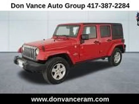Used 2014 Jeep Wrangler Unlimited Sahara image 1