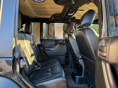 Used 2013 Jeep Wrangler Unlimited Rubicon w/ Dual Top Group image 14