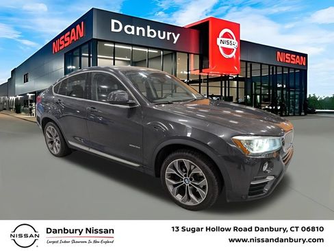 Used 2015 BMW X4 xDrive35i AWD/4WD image 1
