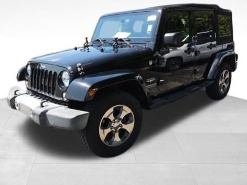 Used 2015 Jeep Wrangler Unlimited Sahara w/ Max Tow Package AWD/4WD image 1