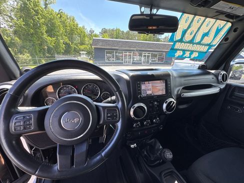 Used 2013 Jeep Wrangler Unlimited Sahara w/ Mopar Chrome Edition Group AWD/4WD image 14
