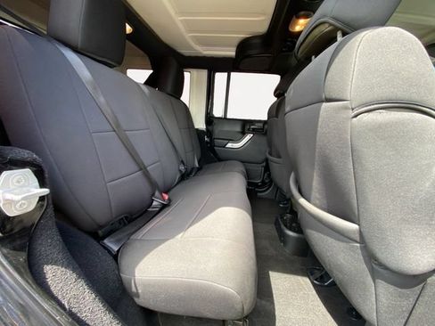 Used 2016 Jeep Wrangler Unlimited Sahara w/ Max Tow Package AWD/4WD image 14