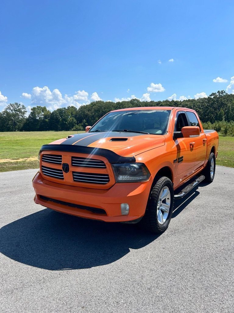 Used 2015 RAM 1500 Sport w/ Ignition Orange Sport Package AWD/4WD image 1