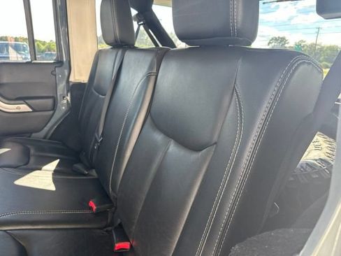 Used 2014 Jeep Wrangler Unlimited Sahara w/ Mopar Chrome Edition Group AWD/4WD image 15