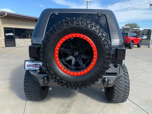 Used 2010 Jeep Wrangler Unlimited Rubicon w/ Dual Top Group image 6