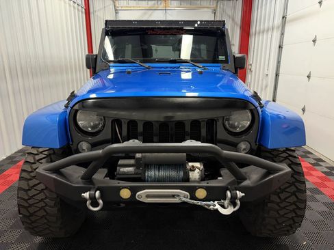 Used 2015 Jeep Wrangler Unlimited Sahara w/ Max Tow Package AWD/4WD image 11
