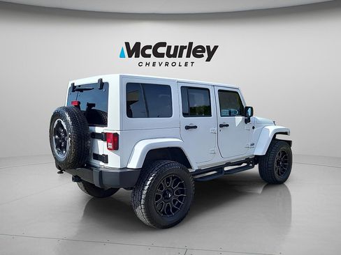 Used 2014 Jeep Wrangler Unlimited Sahara w/ Dual Top Group AWD/4WD image 7