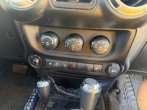 Used 2014 Jeep Wrangler Unlimited Rubicon w/ Dual Top Group AWD/4WD image 26