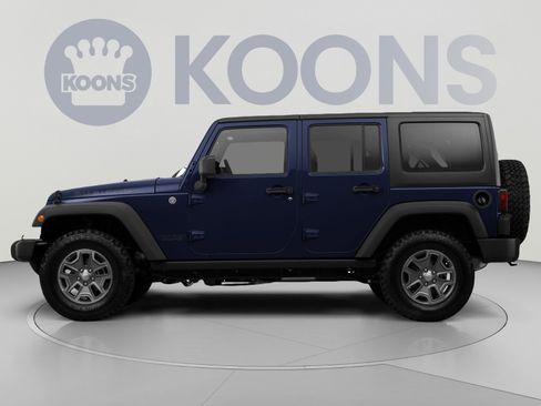 Used 2013 Jeep Wrangler Unlimited Sahara w/ Dual Top Group AWD/4WD image 2