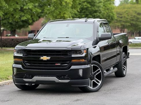 Used 2019 Chevrolet Silverado 1500 LT w/ LPO, Black Pack AWD/4WD image 1