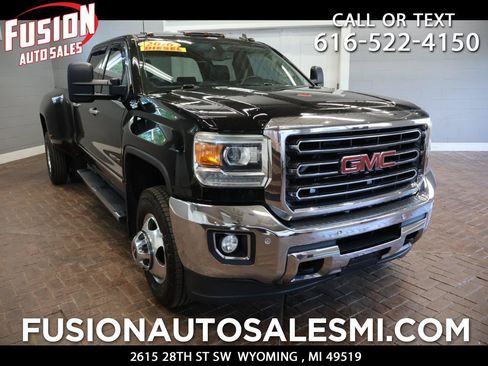 Used 2015 GMC Sierra 3500 SLT w/ Duramax Plus Package AWD/4WD image 1