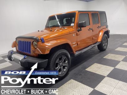 Used 2011 Jeep Wrangler Unlimited Sahara w/ Dual Top Group