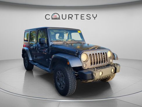 Used 2014 Jeep Wrangler Unlimited Sahara w/ Connectivity Group AWD/4WD image 24