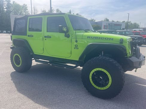 Used 2012 Jeep Wrangler Unlimited Rubicon w/ Dual Top Group image 7