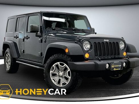 Used 2016 Jeep Wrangler Unlimited Rubicon w/ Dual Top Group AWD/4WD image 1