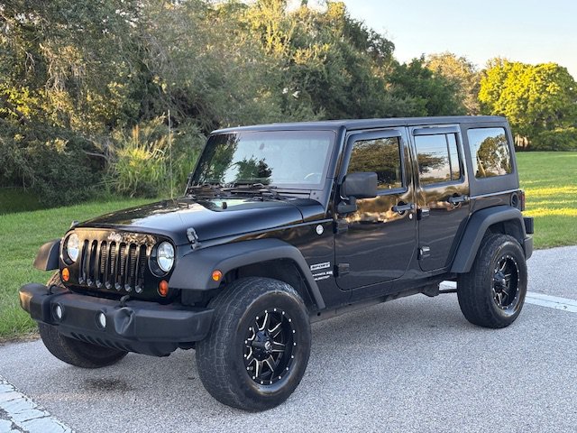 Used 2012 Jeep Wrangler Unlimited Sport AWD/4WD image 1