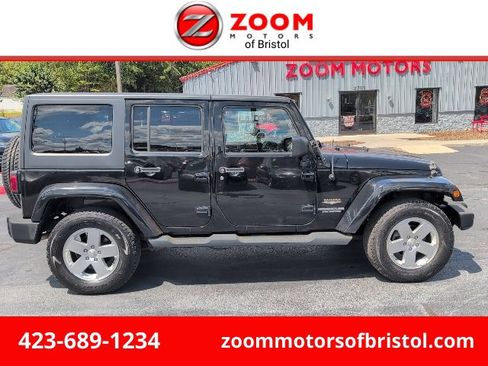 Used 2012 Jeep Wrangler Unlimited Sahara w/ Dual Top Group image 1