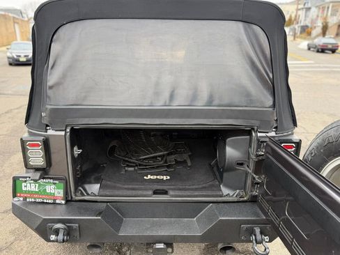 Used 2014 Jeep Wrangler Unlimited Sahara w/ Dual Top Group AWD/4WD image 14