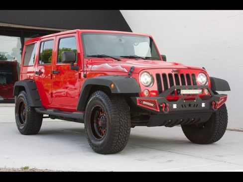 Used 2015 Jeep Wrangler Unlimited Sahara AWD/4WD image 1