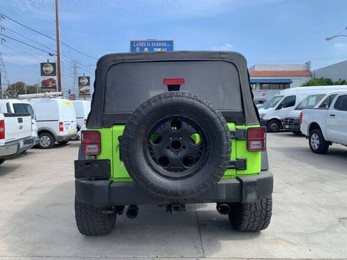 Used 2013 Jeep Wrangler Unlimited Sport w/ Mopar Black Appearance Group AWD/4WD image 6