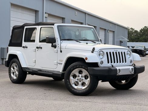 Used 2015 Jeep Wrangler Unlimited Sahara w/ Dual Top Group AWD/4WD image 2