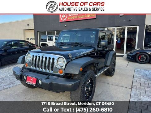 Used 2012 Jeep Wrangler Rubicon w/ Dual Top Group AWD/4WD image 1