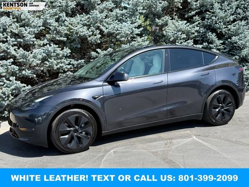 Used 2024 Tesla Model Y Long Range AWD/4WD image 1
