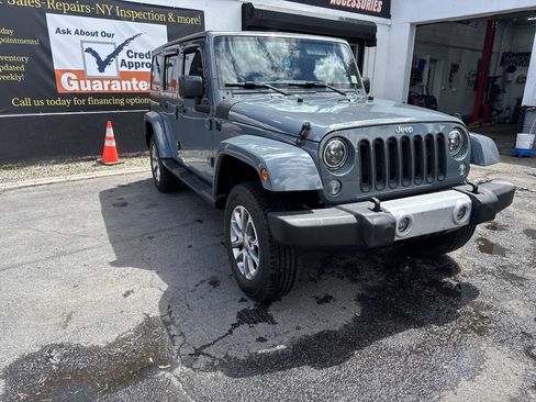 Used 2015 Jeep Wrangler Unlimited Sahara w/ Dual Top Group AWD/4WD image 3