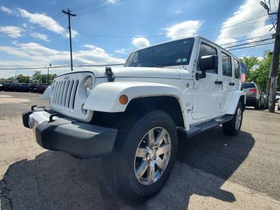 Used 2015 Jeep Wrangler Unlimited Sahara w/ Dual Top Group