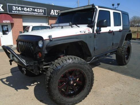 Used 2013 Jeep Wrangler 4WD Unlimited Sport image 2