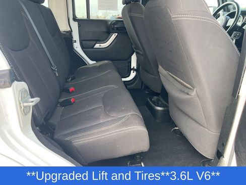 Used 2013 Jeep Wrangler Unlimited Sahara w/ Dual Top Group AWD/4WD image 32