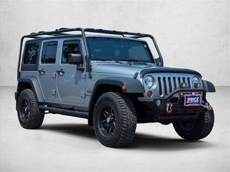 Used 2013 Jeep Wrangler Unlimited Sport AWD/4WD video 3
