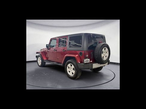 Used 2012 Jeep Wrangler Unlimited Sahara w/ Dual Top Group AWD/4WD image 4