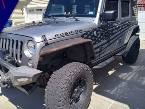 Used 2014 Jeep Wrangler Unlimited Rubicon w/ Dual Top Group AWD/4WD image 1