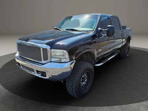Used 1999 Ford F250 4x4 Crew Cab Super Duty image 1