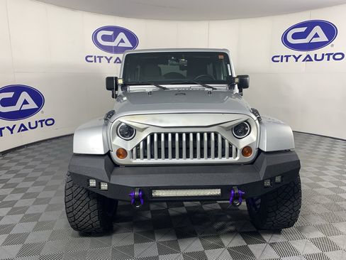 Used 2012 Jeep Wrangler Unlimited Sahara w/ Trailer Tow Group AWD/4WD image 9