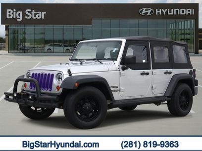 Used 2010 Jeep Wrangler Unlimited Sport w/ Black Appearance Group