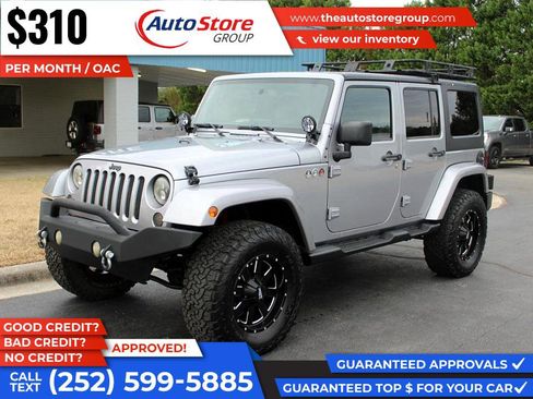 Used 2014 Jeep Wrangler Unlimited Sahara w/ Max Tow Package image 2