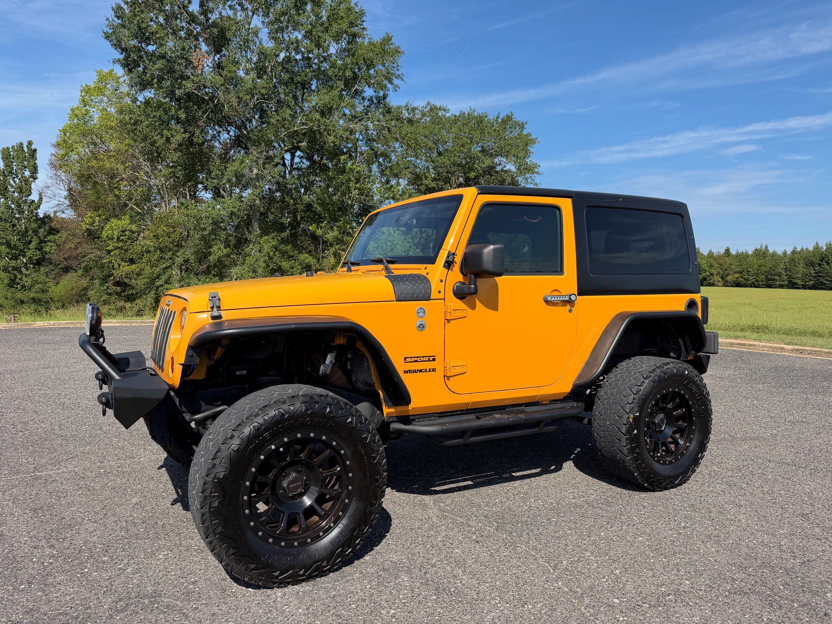 Used 2012 Jeep Wrangler Sport AWD/4WD image 1