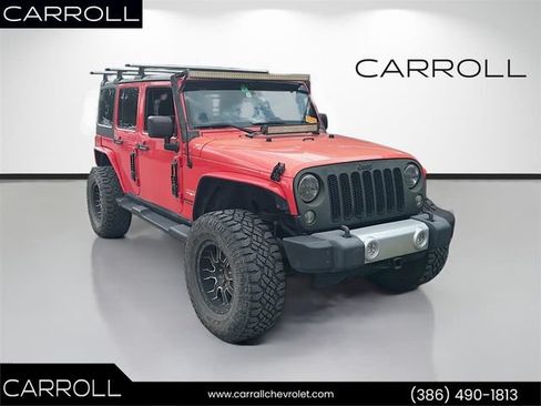 Used 2013 Jeep Wrangler Unlimited Sahara w/ Trailer Tow Group AWD/4WD image 1